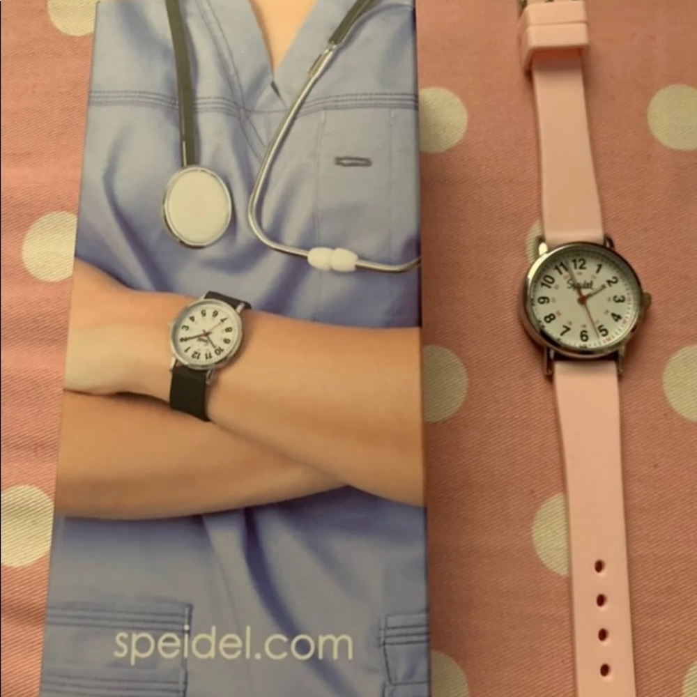 Analog watch with pink silicone band